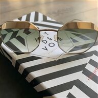 occhiali cartier oro legno usato