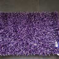 tappeto viola usato