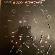 pinza piercing usato