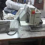macchina taglia cuci industriale usato