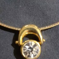 collier oro rigido usato