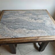tavolo da esterno con piano in pietra usato