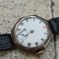 antico orologio argento usato