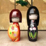 bambole giapponesi legno usato